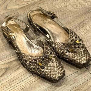 Made in Italy flat with strap. Not sure of brand. Size 8 1/2.